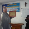 Handing over the certificate