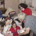 The ladies receive fabrics at Casa Bucuriei